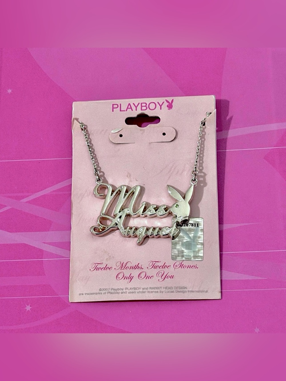 Playboy miss August silver necklace NWT